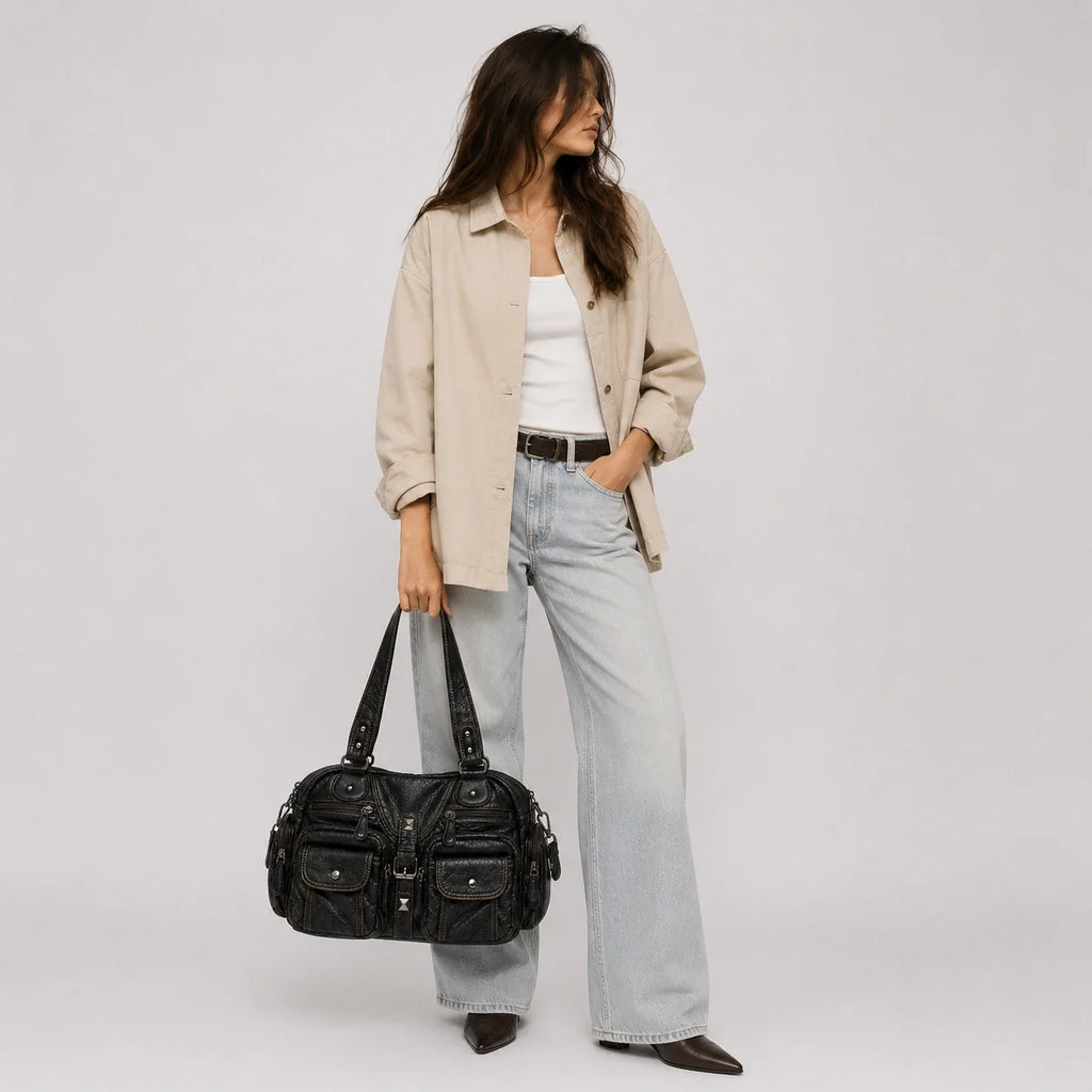 Vintage Handtasche Schwarz – Nahaufnahme der Materialstruktur