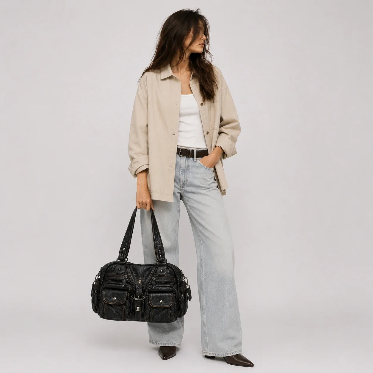 Vintage Handtasche Schwarz – Nahaufnahme der Materialstruktur